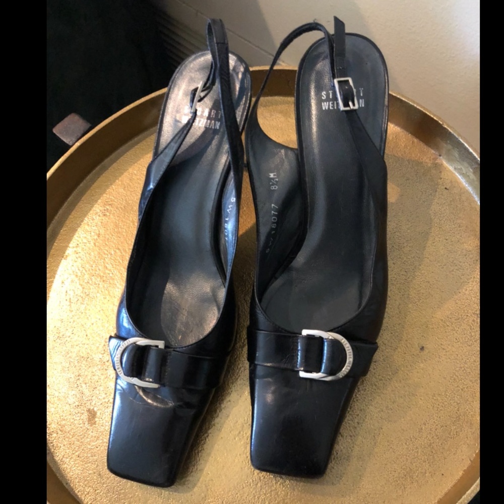 Black leather Stuart Weitzman pumps